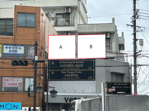 枚方市香里園町香里園駅前T字交差点正面AB